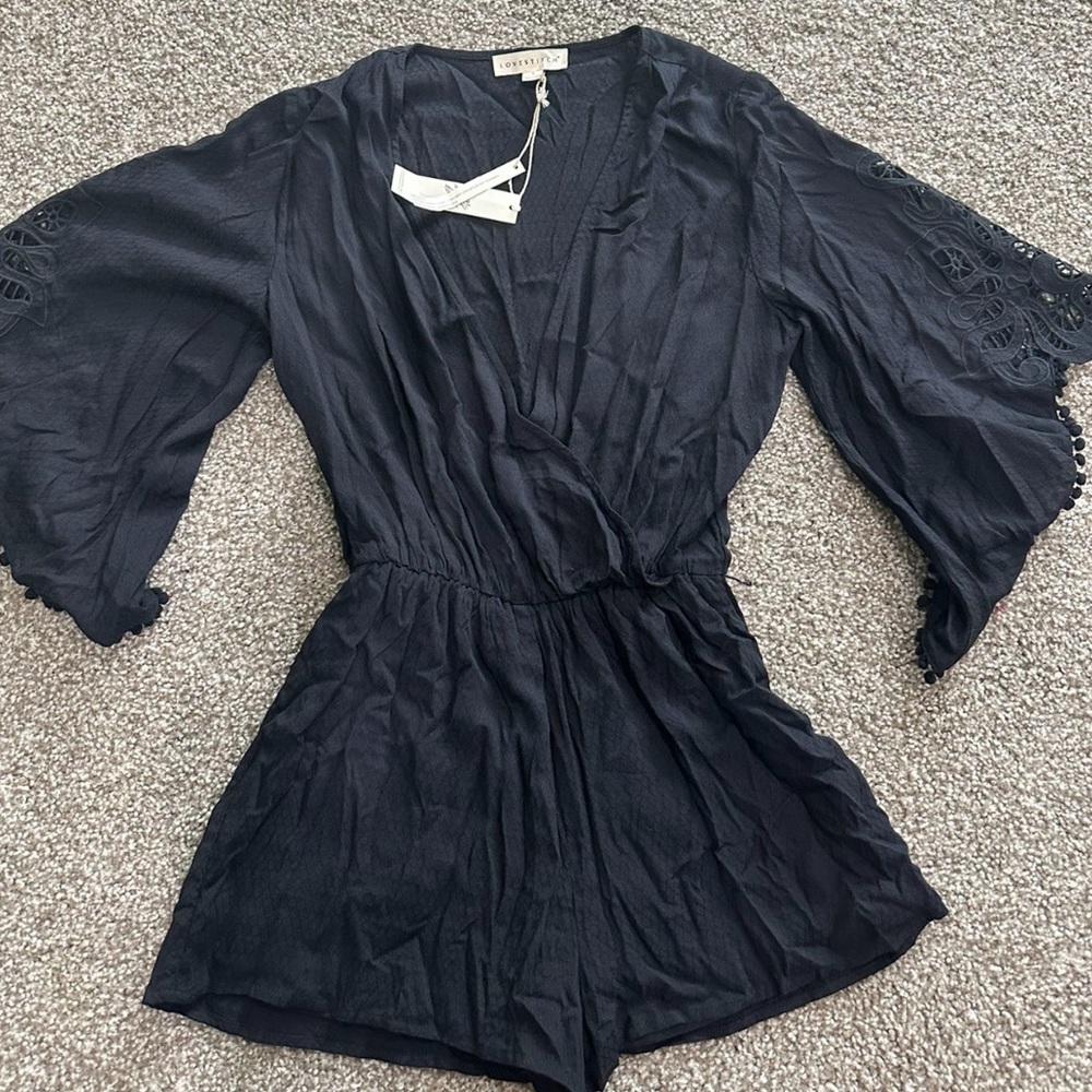 Love stitch romper brand new